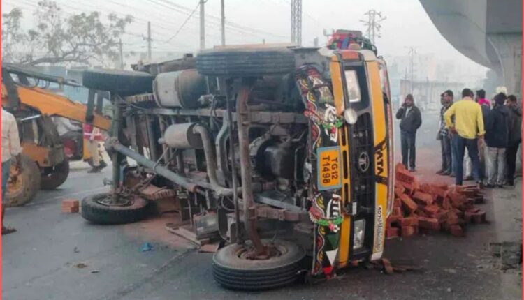 Mini lorry overturns