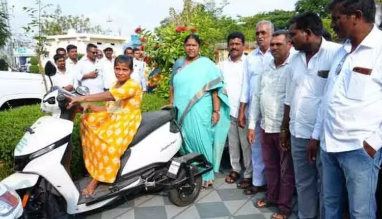 Seethakka distributes scooters to disabled