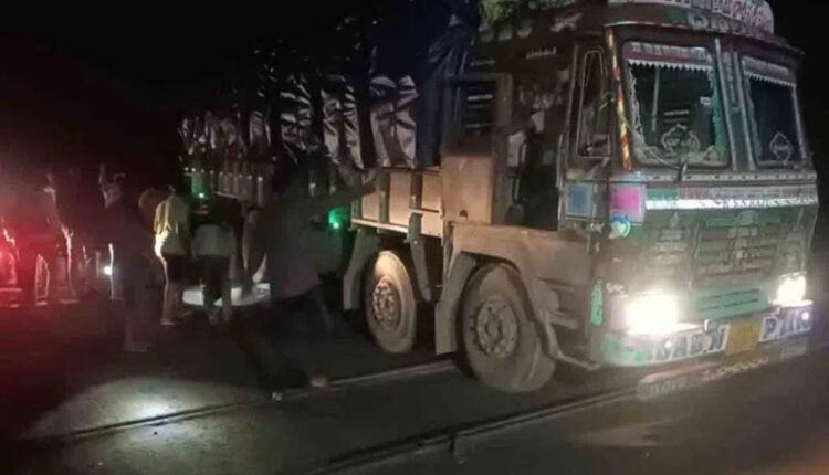 Lorry stuck on railway tracks disrupts trains